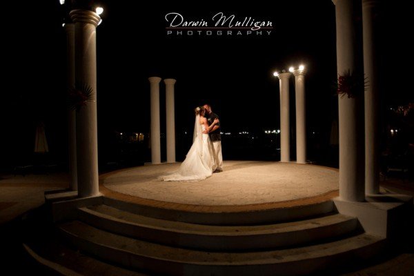 Night photography of bride and groom kissing at Cuba destination wedding