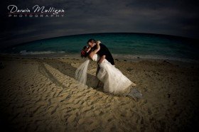 "The Dip" kiss on the beach, Cuba destination wedding