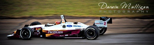 an Indy car races at the Edmonton City Centre Airport