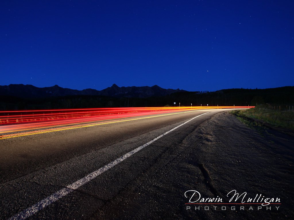 Colorado-tail-lights-at-night-Dallas-Divide