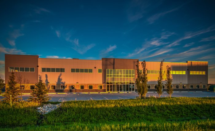 Commercial photo shoot of a newly constructed building photographed at sunrise to showcase the building