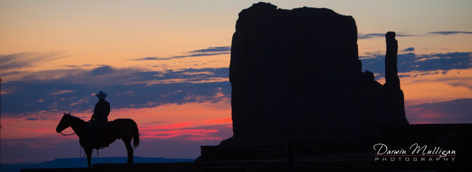 Horse and Rider at Monument Valley at Sunrise