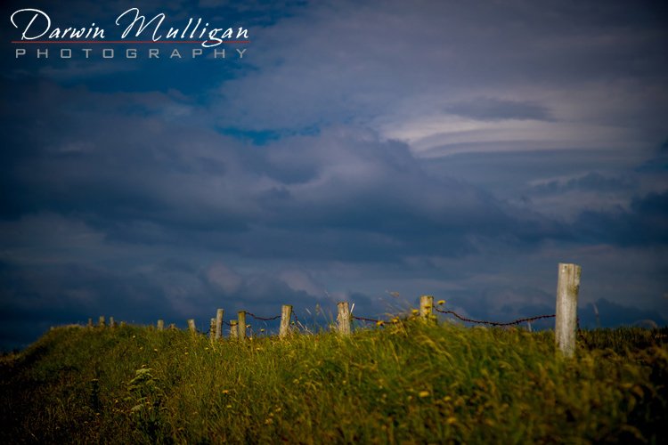 Ireland-Dingle-Slea-Head-Drive-fence-and-storm-clouds