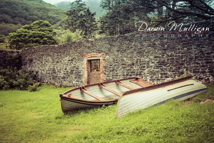 Ireland-Kylemore-Abbey-old-boats-and-wall