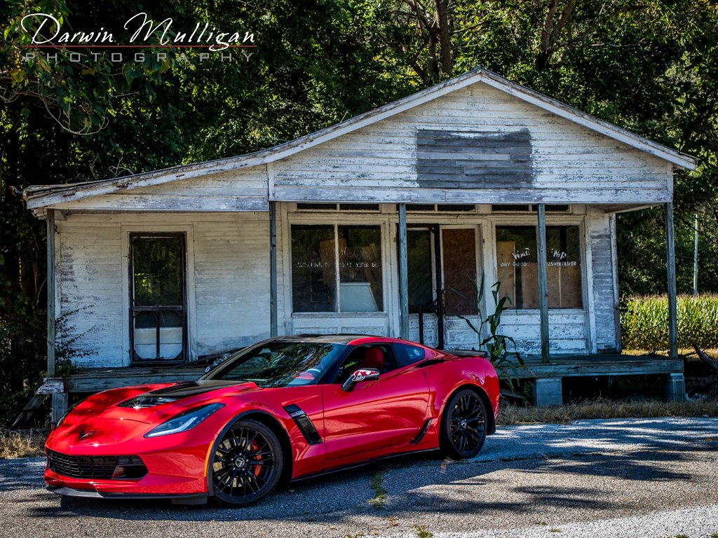 Abandoned building and my Torch Red Z06 Corvette