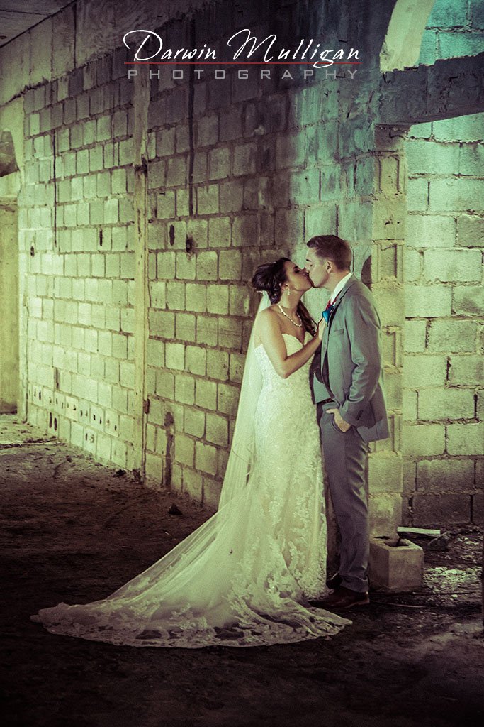 Bride and Groom Kissing In An Abandoned House