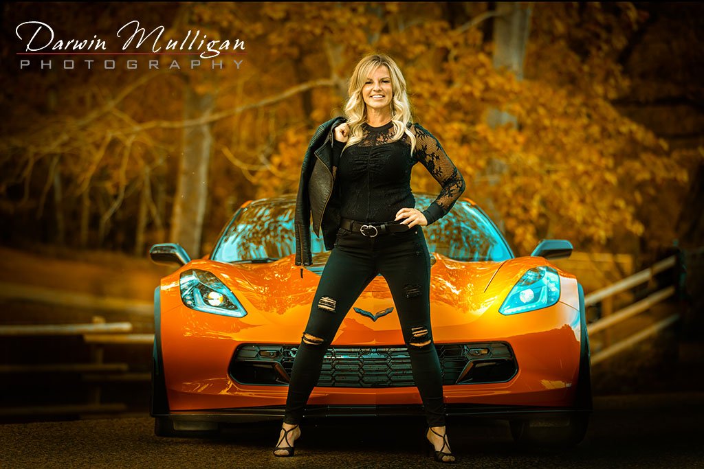 Woman Posing In Front Of Her Chevy Corvette Z06