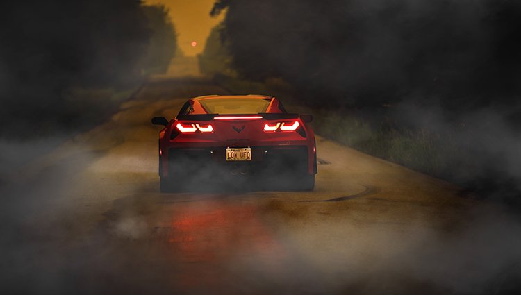 Torch Red Corvette Z06 on a Smoky Morning