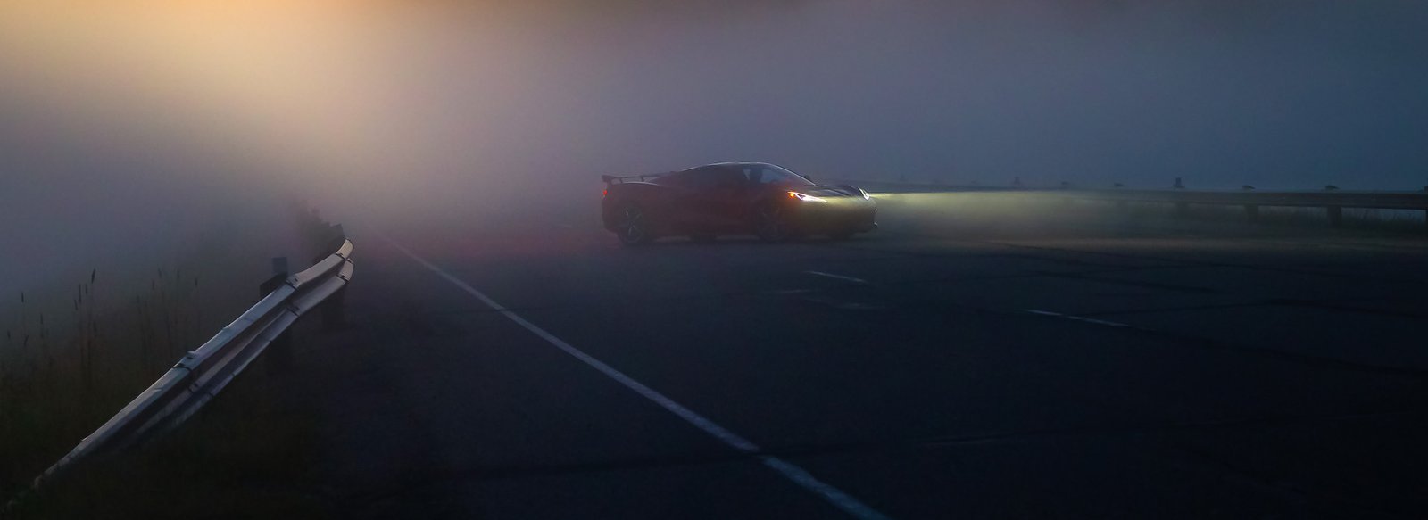 C8 Corvette in Zombie Fog on a bridge Highway 771 Alberta pre dawn with Zombie Fog